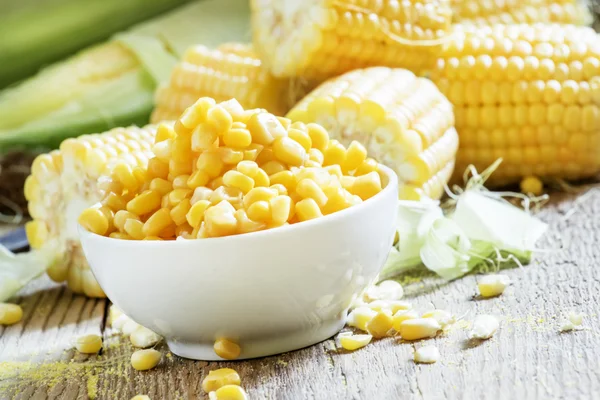 Canned sweet corn in white bowl