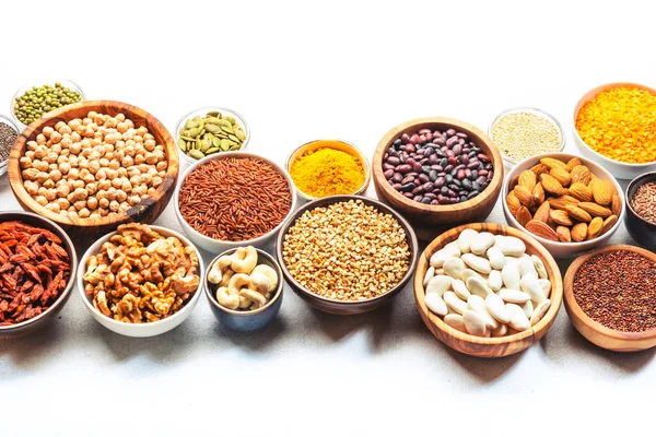 Conjunto Superalimentos Legumes Cereais Nozes Sementes Tigelas Sobre Fundo Branco — Fotografia de Stock