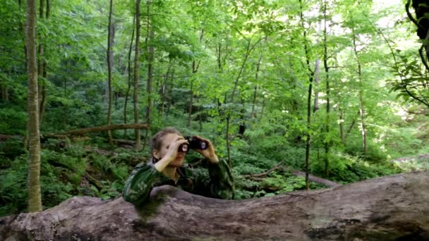 Image result for man lying down in camouflage with bincoluars