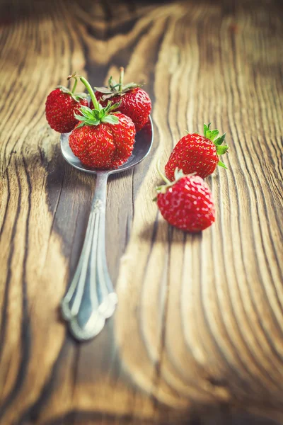 Fresh red strawberries in silver spoon — Stock Photo, Image