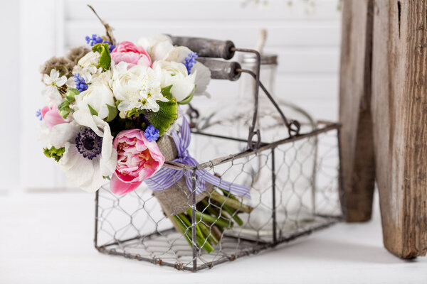 Pastel spring bouquet in rustic composition