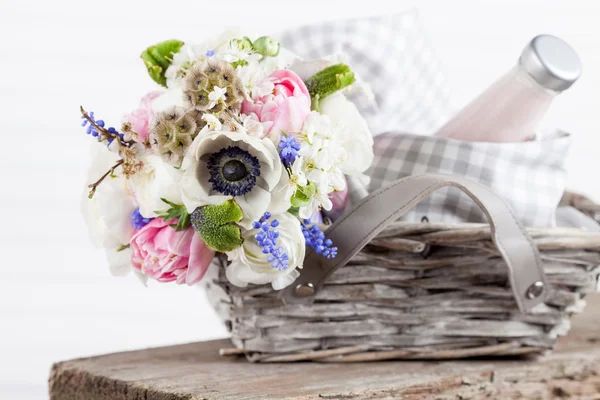 Rustic picnic basket with flowers