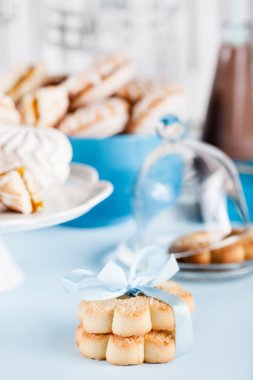 Celebrating with sweets, candies, biscuits and gifts