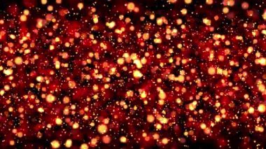 Doğum günlerini ve bayramları kutlamak için turuncu altın parçacıkları ışıldatma animasyonu. Bokeh arkaplanlı 4K döngü ve koyu arkaplanda parlayan parçacıklar. Işık sızıntısı efektli animasyon video.