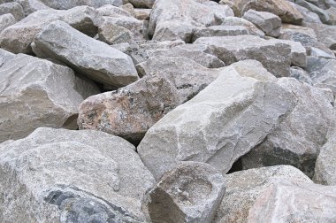 Arka plan gri ve kahverengi granit kayalar