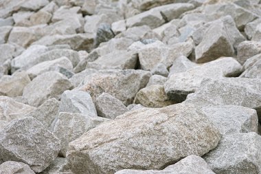 Arka plan gri ve kahverengi granit kayalar