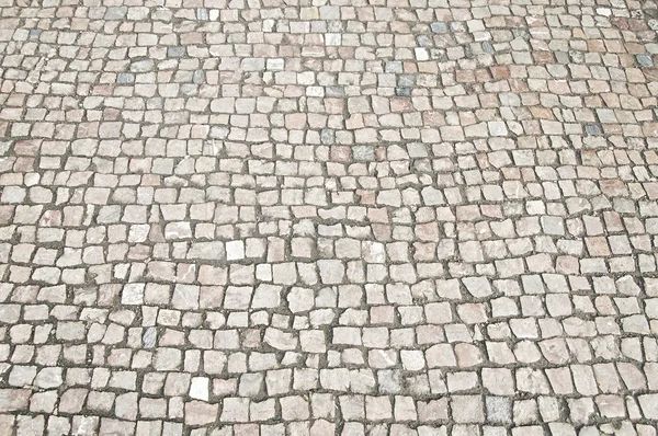 Grå sten trottoaren bakgrundsstruktur — Stockfoto