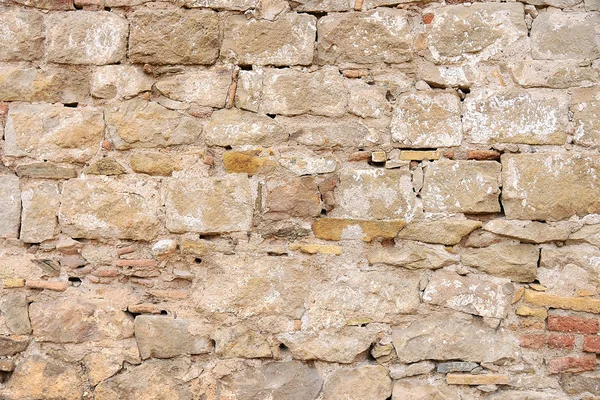 Old beige stone wall background texture — Stock Photo, Image