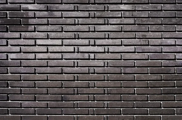 Svart tegel vägg bakgrund struktur — Stockfoto