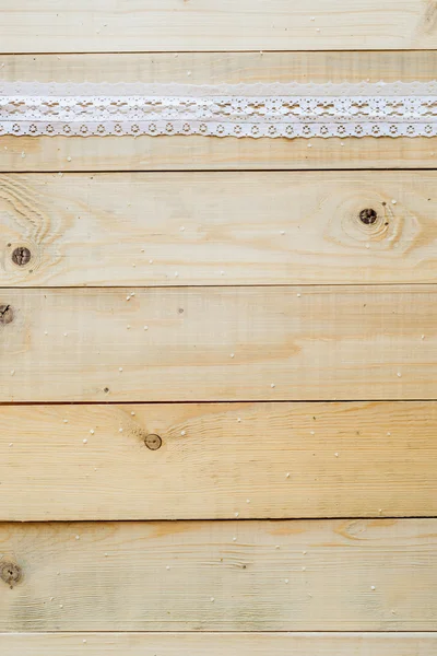 Concepto de artesanía, cinta de encaje sobre fondo de madera — Foto de Stock