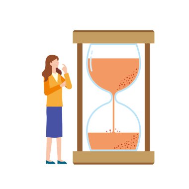 Bir kadın kum saatine bakıyor.