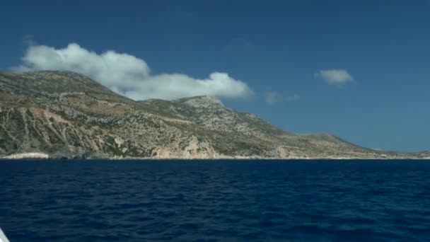 Passing by the shore of one of the Greek islands. — Stock Video