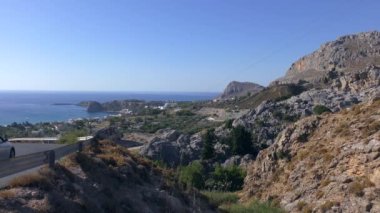 Akdeniz kıyısı, kıyı şeridinin yüksekliğinden sahil şeridi. Rodos, Stegna.