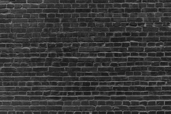 Old black brick wall background