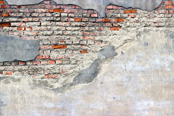 오래 된 손상 된 벽돌 벽 및 석고 — 스톡 사진