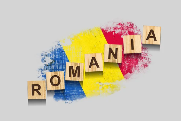 罗马尼亚 木块上的题词 在罗马尼亚国旗的背景下 3D插图 被灰色的背景隔离了设计要素 — 图库照片