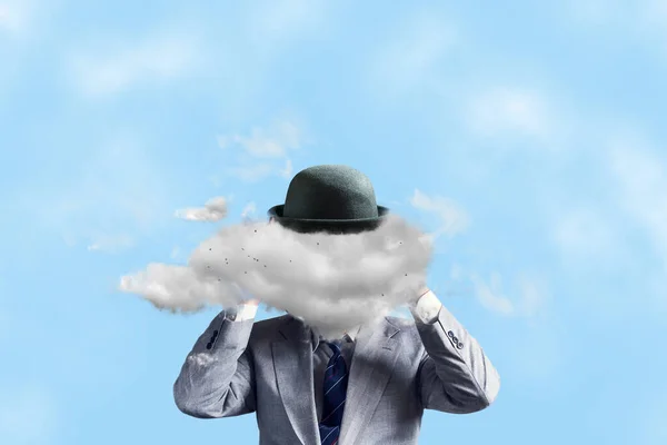 Businessman in a hat, with a cloud instead of a head, with arms raised. The concept of tough decision making, creative thinking, creativity, business. Business.