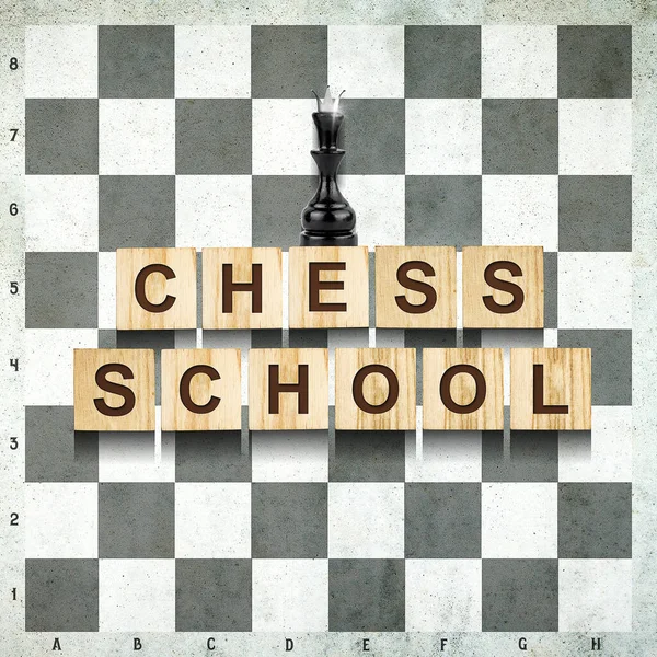 Chess School. Words on wooden blocks, against the background of a chessboard. Black queen. Sport. Chess. Background. Education. Sports background.