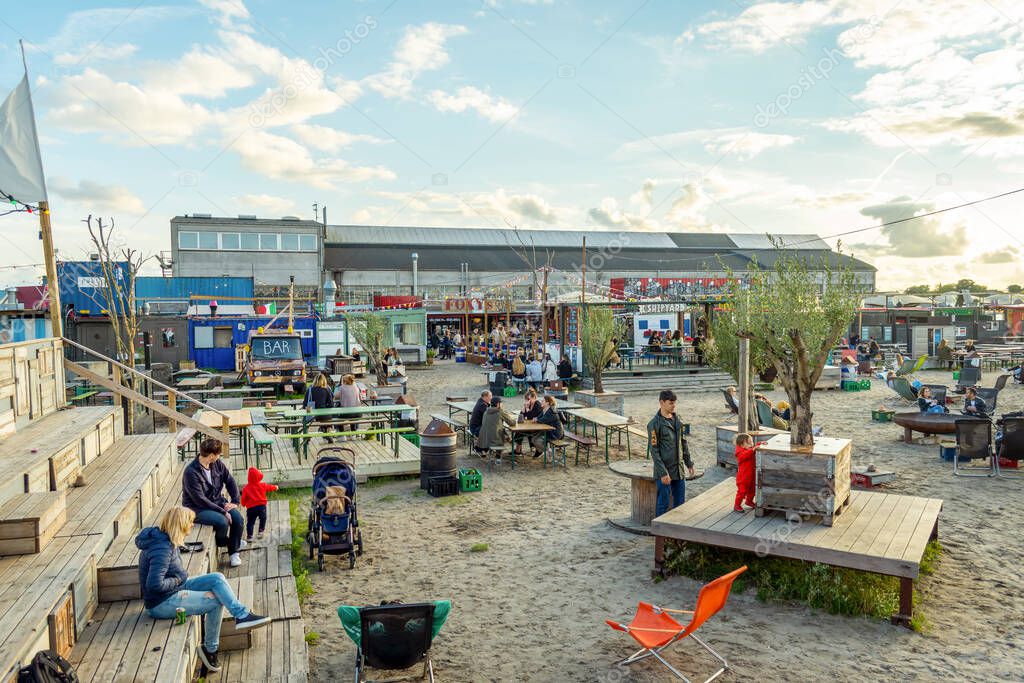 Copenhagen. Denmark. 12. September. 2021. Reffen Street Food Market. People are resting in beautiful street cafes. Landmarks of Copenhagen. Denmark. Recreation Travel