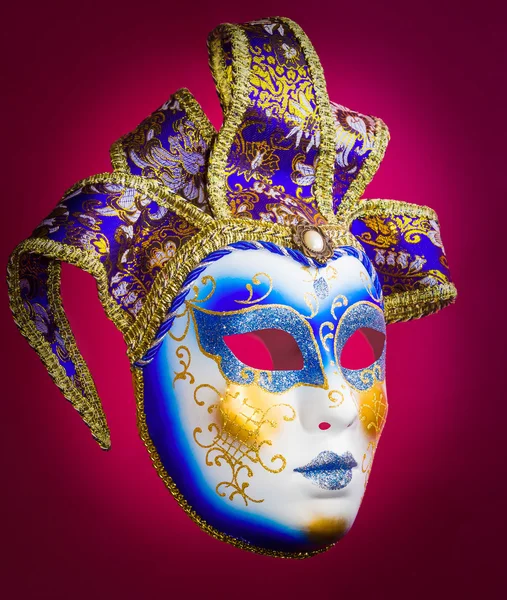 Venice mask on red background — Stock Photo, Image