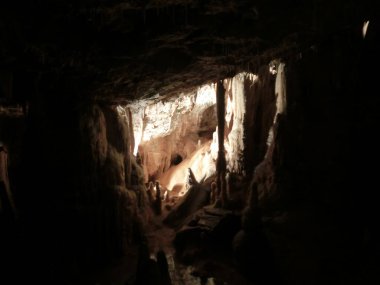 Mağarada, Postojna grotte veya Postojnska jama, Slovenya, Avrupa 'da ışıklandırılmış karst resimleri