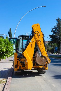 Mini buldozer, kazı ya da yükleyici. İnşaat, endüstri kavramı.