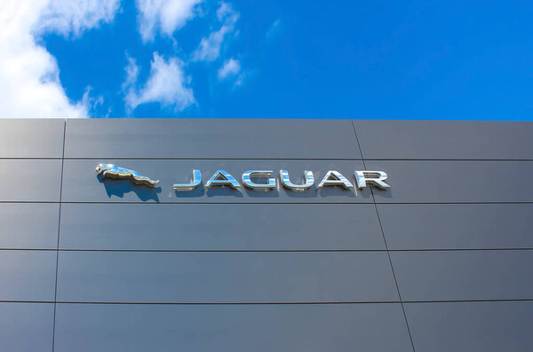 Kyiv, Ukraine - May 8, 2021: Jaguar Land Rover logo on a store. Land Rover is a car brand that specialises in four-wheel-drive vehicles, owned by British multinational car manufacturer Jaguar Land Rover