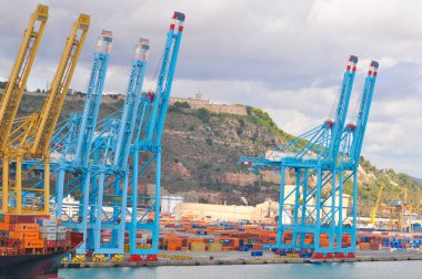 Barcelona, Spain - September 26, 2025: Cranes in the container terminal in the port of Barcelona