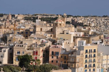 View of old building with windows, balconies in city. Republic of Malta, the picturesque city Valetta, Malta.