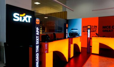 Nice, France - September 27, 2025: Sixt brand car rental agency office at Terminal 1 of international Nice airport at Nice, France on September 27, 2025