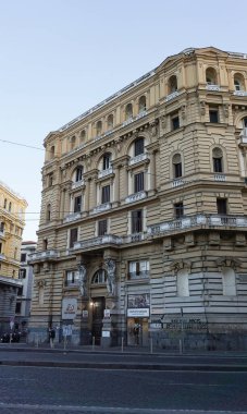 Naples, Italy - September 21, 2025: Piazza Nicola Amore, neo-Renaissance style buildings, located in the center of Umberto I street, next to Garibaldi Central Station. Facade, gate, sculpture
