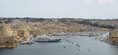 Drone view of Valletta city - little yachts and boats near Valletta in Malta