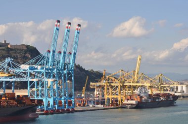 Barcelona, Spain - September 26, 2025: Cargo containers Hapag-Lloyd and Maersk stored on the cargo ships. Hapag-Lloyd is a global leader in container shipping