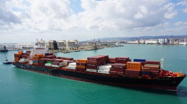 Barcelona, Spain - September 26, 2025: Cargo containers Hapag-Lloyd stored on the cargo ships. Hapag-Lloyd is a global leader in container shipping