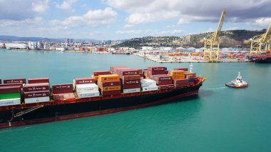 Barcelona, Spain - September 26, 2025: Cargo containers Hapag-Lloyd stored on the cargo ships. Hapag-Lloyd is a global leader in container shipping