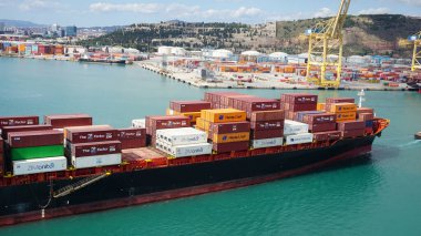 Barcelona, Spain - September 26, 2025: Cargo containers Hapag-Lloyd stored on the cargo ships. Hapag-Lloyd is a global leader in container shipping