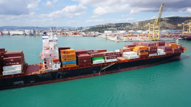 Barcelona, Spain - September 26, 2025: Cargo containers Hapag-Lloyd stored on the cargo ships. Hapag-Lloyd is a global leader in container shipping
