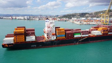 Barcelona, Spain - September 26, 2025: Cargo containers Hapag-Lloyd stored on the cargo ships. Hapag-Lloyd is a global leader in container shipping
