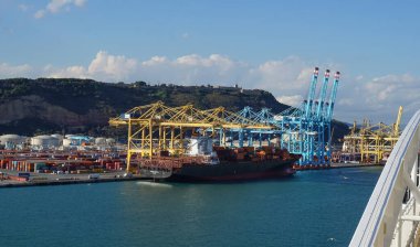 Barcelona, Spain - September 26, 2025: Cargo containers Hapag-Lloyd and others stored on the cargo ships. Hapag-Lloyd is a global leader in container shipping