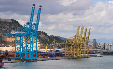 Barcelona, Spain - September 26, 2025: Cranes in the container terminal in the port of Barcelona