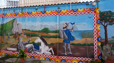 Palermo, İtalya - 18 Aralık 2025: 18 Aralık 2025 'te İtalya' nın Palermo kentindeki sokakta renkli duvar resimleri veya sanat eserleri