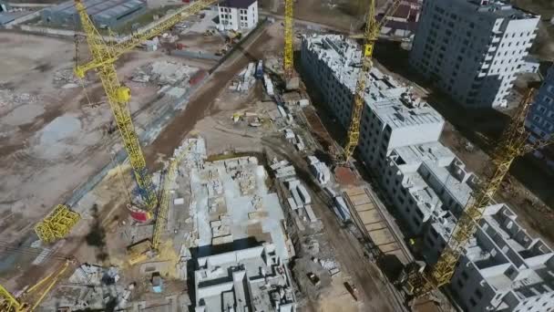 Aerial footage of construction site with building cranes — Stock Video