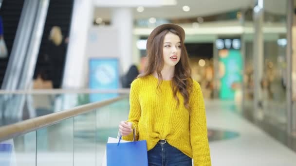 Stylish woman walking in mall in slow motion — Stock Video