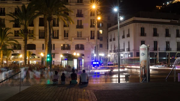 Atmosphere of Explanada main street in Alicante at night, Spain
