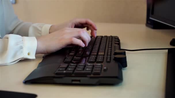 Female hands typing on keyboard, woman using computer, working at home office — Stock Video