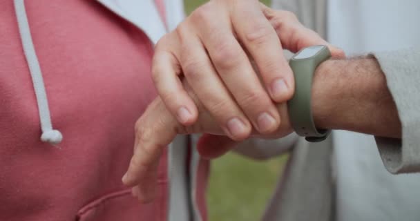 Sportsman pressing button on fitness bracelet, smart health tracker, technology — Stock Video