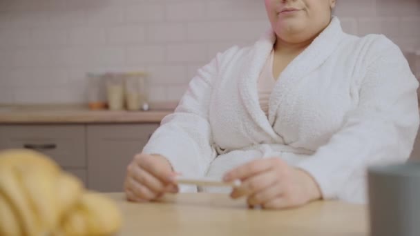 Upset Overweight Woman Bathrobe Holding Pregnancy Test Health Problem — Stock Video