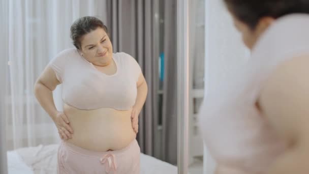 Happy Plump Woman Admiring Her Body Standing Front Mirror Confidence — Stock Video