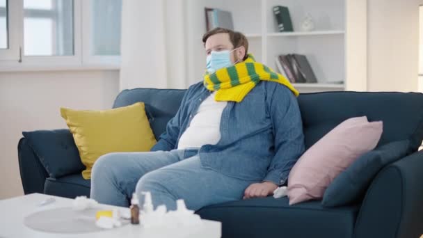 Sad Oversize Man Mask Feeling Sick Isolating Home Coronavirus Disease — Stock Video