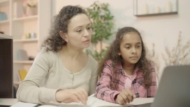 Puzzled Mother Helping Daughter Complicated Home Assignment Education — Stock Video